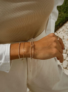 PULSEIRA BOLINHAS ENTRELAÇADAS - BANHADO A RODIO BRANCO