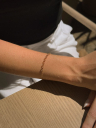 PULSEIRA COM ELOS REDONDOS NO MEIO - BANHADO A RODIO BRANCO
