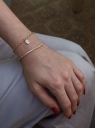 PULSEIRA COM PINGENTE NOSSA SENHORA DAS GRAÇAS CRAVEJADO - BANHADO A RÓDIO BRANCO