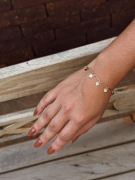 PULSEIRA CORAÇÕES LISOS PENDURADOS - BANHADO A RÓDIO BRANCO