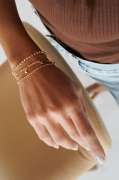 PULSEIRA ESFERAS PEQUENAS LISAS - BANHADO A OURO
