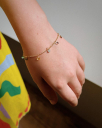 PULSEIRA INFANTIL PEDRINHAS COLORIDAS E LISAS - BANHADO A OURO