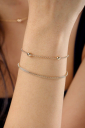 PULSEIRA MALHA OCA BANHADA A OURO